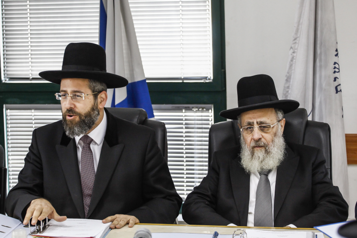Chief Ashkenazi Rabbi David Lau (L) and Sephardi Chief Rabbi Yitzhak Yosef attend a meeting of the Rabbinate Council in Jerusalem Photo by Flash90